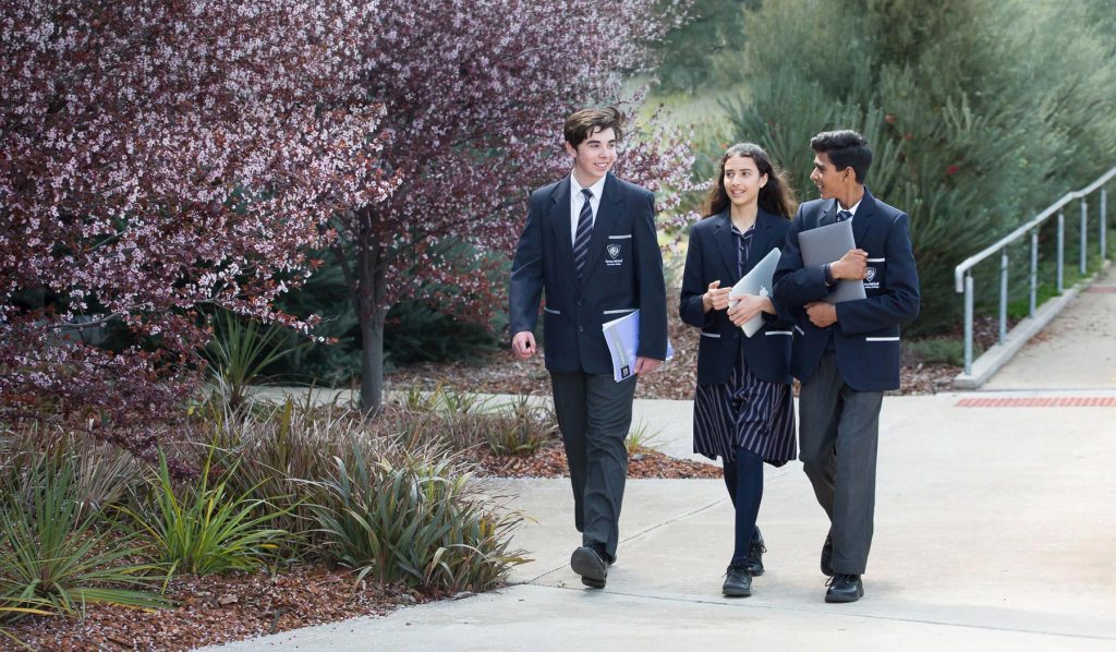 Students walking on school grounds